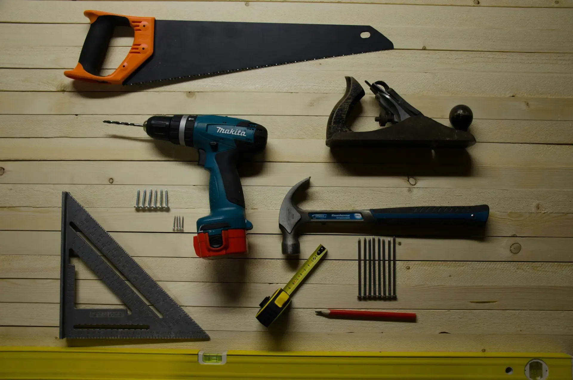 Professional fire door installation tools and CE-marked hinges used by Young's Construction